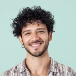 Handsome man smiling, happy face portrait close up